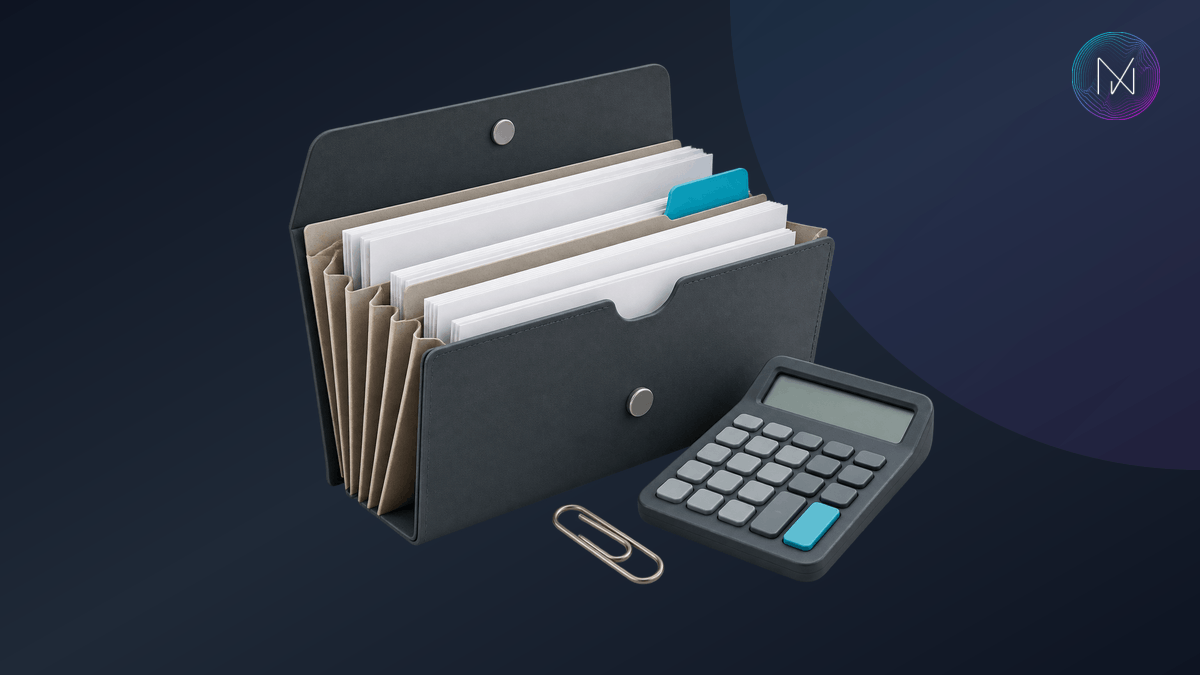 Business records and a calculator prepared for a GST review