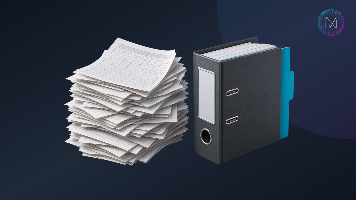 An overloaded stack of spreadsheet sheets beside an organised business ledger